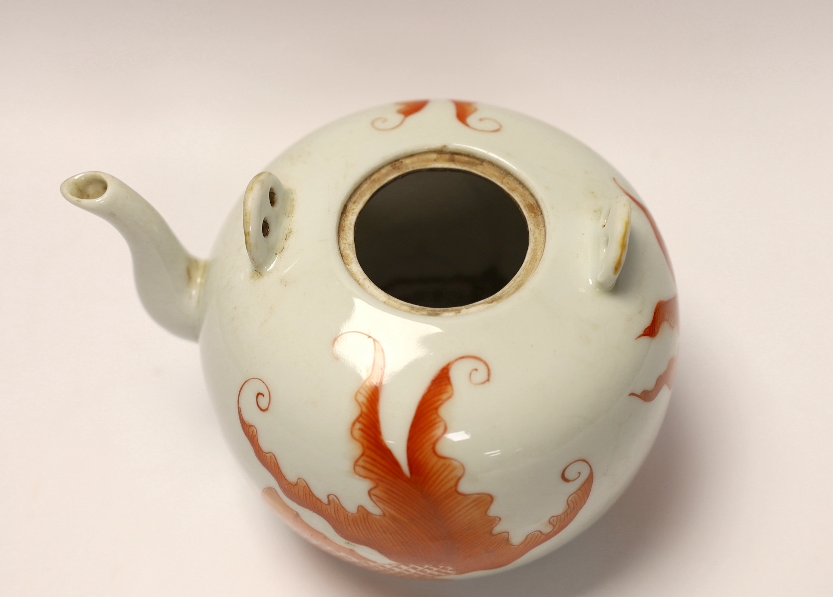 A Chinese iron red enamelled globular teapot, 11.5cm